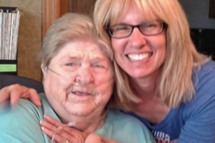 Caregiver with senior smiling